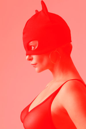 Vertical portrait of young gorgeous woman posing over white background. Mock-up.の写真素材