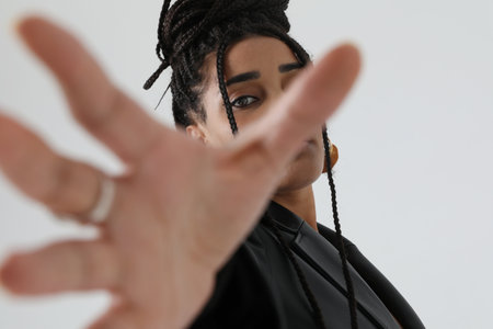 African American young woman stretching her hand. Horizontal mock-up.の写真素材