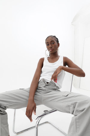 Young African American woman, wearing casual clothing posing in the studio.の写真素材