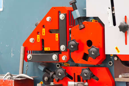 Big red machine with black handles