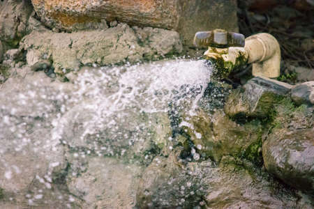 Water floing and being wasteの写真素材