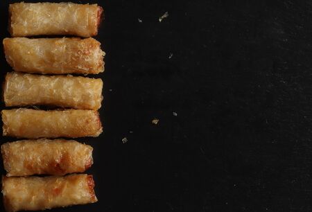 Photography of vietnamese spring roll on slate background for restaurant menu