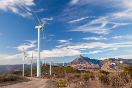 Wind Turbines generating electricity on a remote hillside in Spain