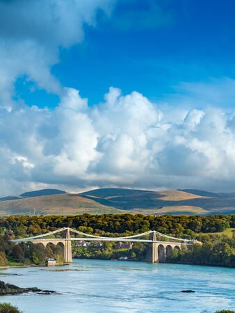 Thoma Telford's Menai Bridge spanning the Menai Straits between Bangor and Angelesey, North Walesの写真素材