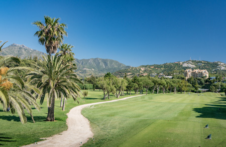 Golf course in Marbella, costa del Sol, Spain with La Concha Mountain in the backgroundの写真素材