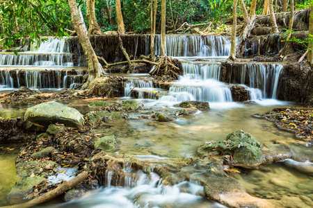 Waterfall in Tropical forest at Huay Mae Kaminの写真素材