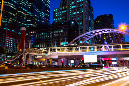 Blurred traffic light trails on road at night in Bangkok. Thailandのeditorial素材