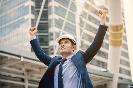 A Man happy as winning after completed his project