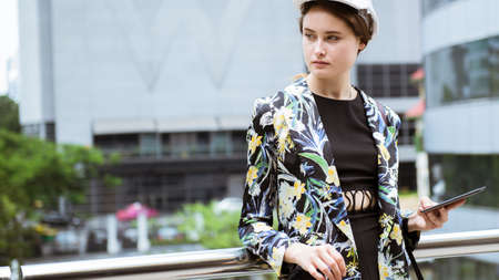 Beautiful woman engineer holding a tabletの写真素材