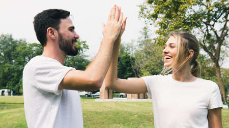 Happy cheerful couple  in the park, Relation conceptの写真素材