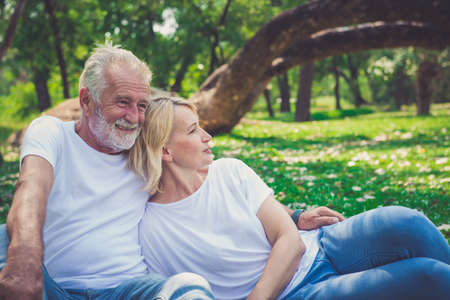 Senior couple relax in parkの写真素材