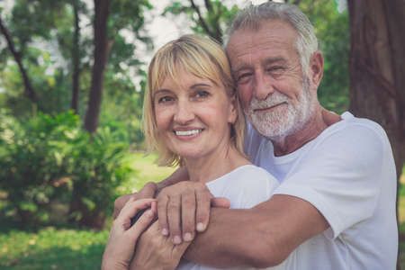 Senior couple in love enjoying togetherness outdoor.の写真素材