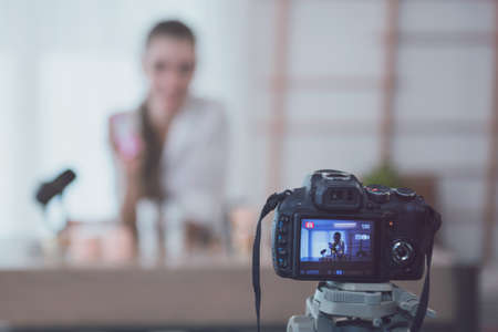 Beautiful young girl blogger is live streaming.の写真素材
