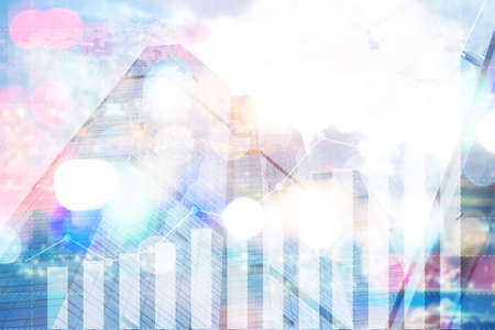 Double exposure of graph and rows of coins for finance and business