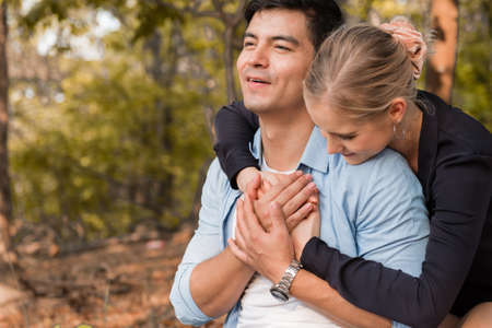 Young romance couple relax in the park