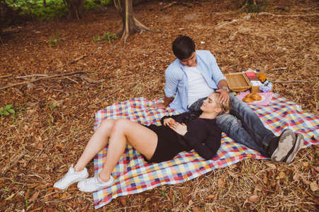 Beautiful couple in love in the parkの写真素材