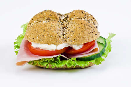 Freshly made sandwich with ham and vegetables - isolatedの写真素材