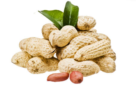 Closeup peanuts over white background