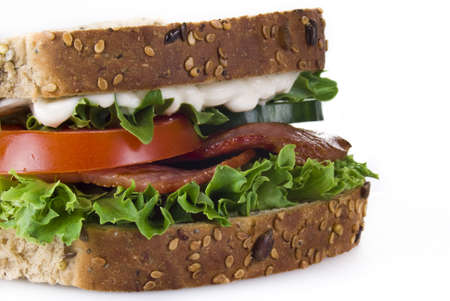 Freshly made bacon sandwich isolated over white backgroundの写真素材