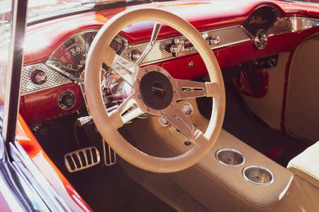 Red and tan leather interior of a classic car