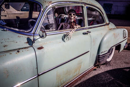 40s old Green Chevy driver's side view with skeletonのeditorial素材