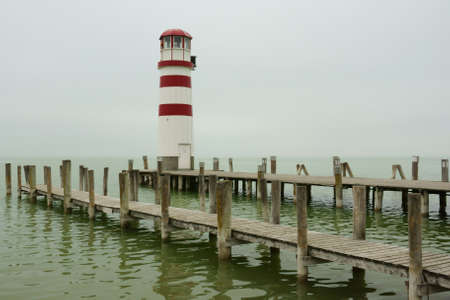 Lighthouse on a gloomy fall day                                の写真素材