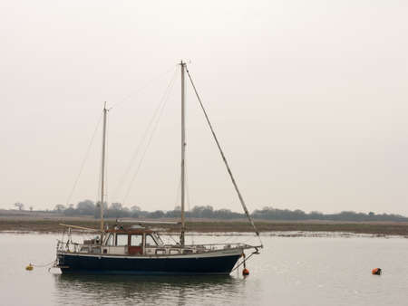 A moored blue boat.の写真素材