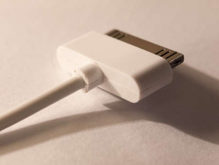 close up of a usb charger head for a mp3 player on a white backgroundの写真素材