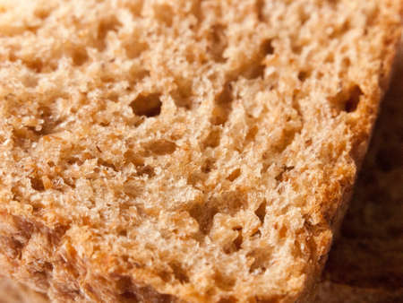 close up texture of soft brown bread studioの写真素材