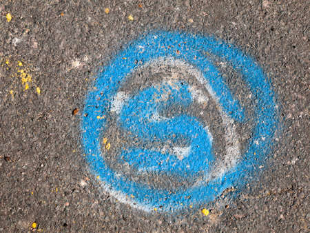 blue letter s circle paint on roadの写真素材