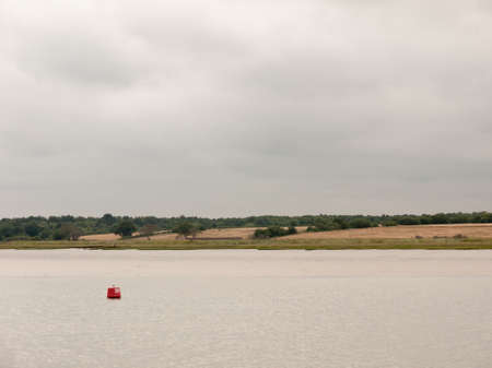 Red Buoy Out at Sea Landscape No People; Essex; UK