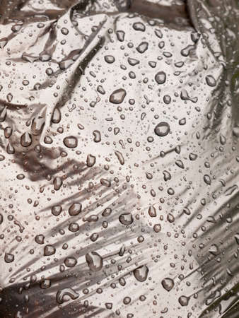 water close drops up on a black bin bag; Essex; UK