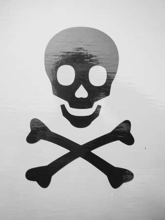 black and white skull and cross bones skeleton detail print; England; UKの写真素材