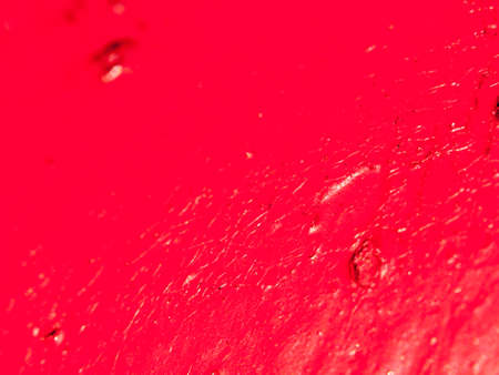close up grunge background texture of red painted metal; England; UKの写真素材