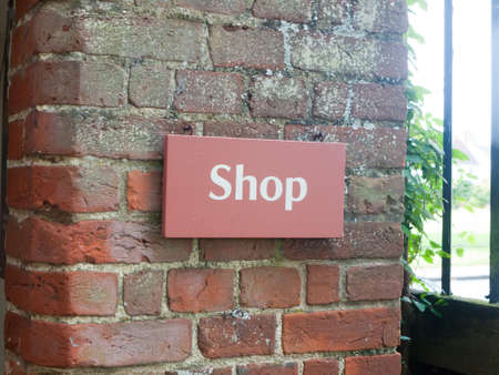 close up of english heritage sign outside shop; England; UKの写真素材
