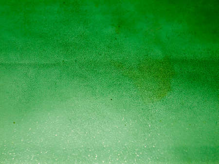 close up of retro green surface rough stained; England; UKの写真素材