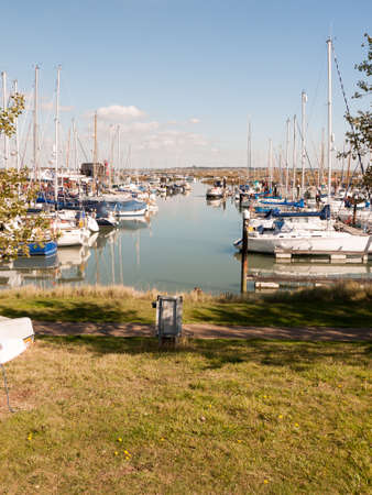 view of boats parked in dock harbour sunny day; essex; england; UKの写真素材