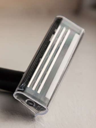 close up of male plastic razor heat unused covering; essex; england; ukの写真素材