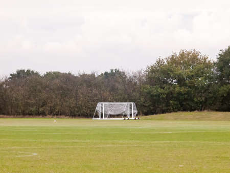 empty football field with goal post and net; essex; england; ukの写真素材
