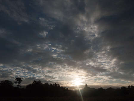 stunning dramatic morning cloudy blue sky overhead space