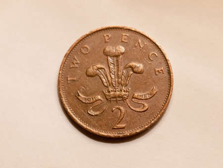 close up of english two pence brown coin uk currency; essex; england; ukの写真素材