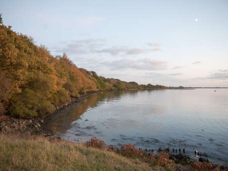 beautiful evening bay scene outside water wave ripples empty open space harbour country; essex; england; ukの写真素材