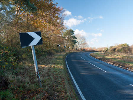 black and white chevron road sign turn way no cars country ; essex; england; ukの写真素材