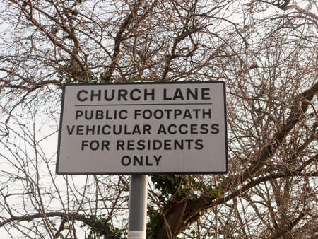 special white road sign pole church lane public footpath access for residents only; essex; england; ukの写真素材