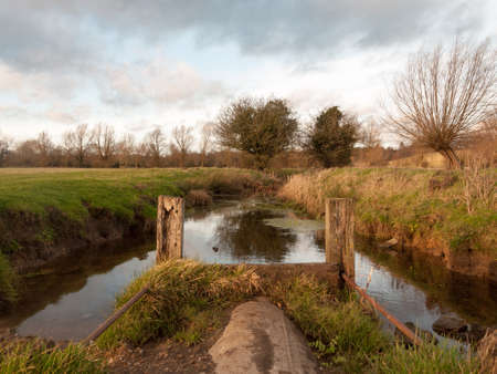 wet waterlogged country farm land stream eddy ; essex; england; ukの写真素材