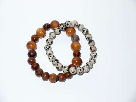 two bead bracelets white background studio small fancy unique; essex; england; ukの写真素材