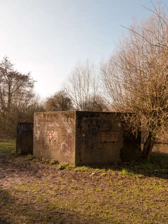old war bunker marked graffiti no people old retro abandoned damage park public; essex; england; ukの写真素材