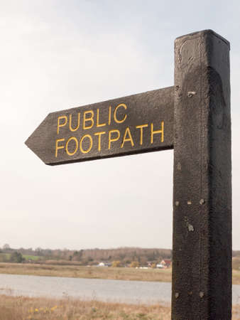 close up of black wooden public footpath sign way trail; essex; england; ukの写真素材