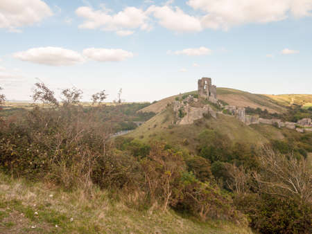 corfe castle dorset holiday skyline blue clouds nature landscape building ruins medieval summer day; Dorset; England; UKの写真素材