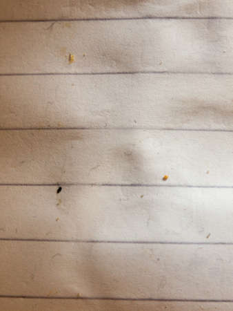 close up of dirty piece of lined paper macro retro grunge; essex; england; uk